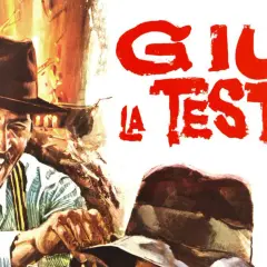 Un uomo con cappello e baffi ride, mentre sullo sfondo campeggia il titolo "Giù la testa spiegazione finale".