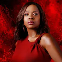Viola Davis in a red dress against a fiery red background.