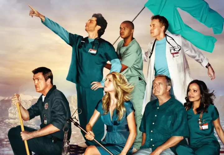 Cast di Scrubs in posa epica, con un medico che indica l'orizzonte. Una recensione di scrubs che cattura lo spirito della serie.