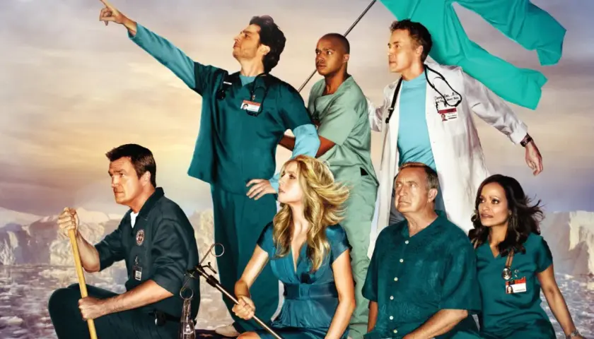 Cast di Scrubs in posa epica, con un medico che indica l'orizzonte. Una recensione di scrubs che cattura lo spirito della serie.
