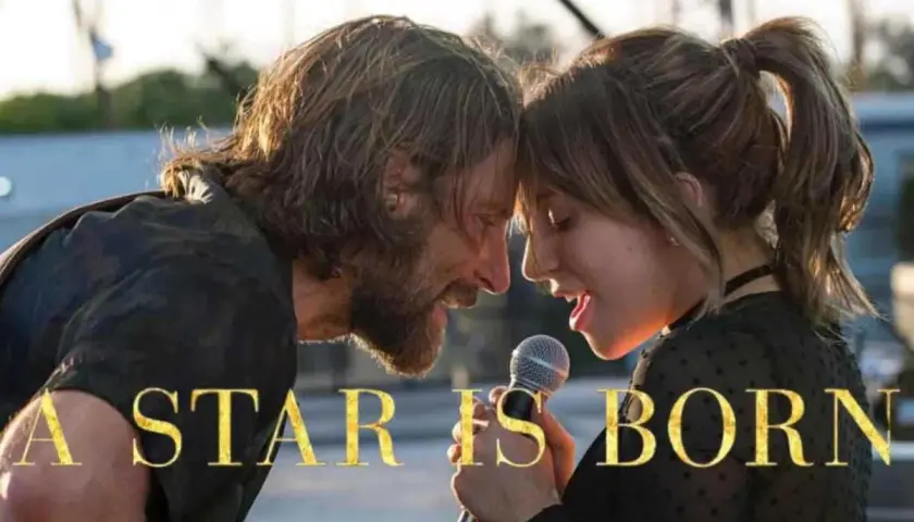 Un uomo e una donna cantano insieme, un momento intimo prima che "A Star Is Born" diventi un tragico addio.