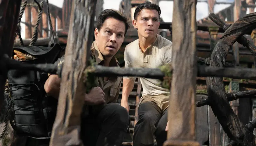Recensioni Uncharted (film): Mark Wahlberg e Tom Holland in un'avventura mozzafiato tra rovine e tesori perduti.