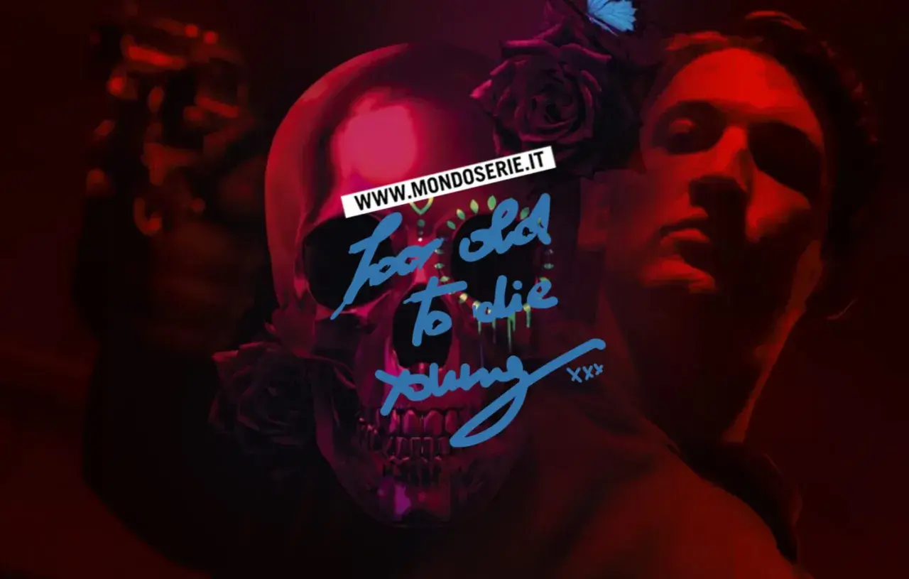 Recensione "Too Old to Die Young": teschio decorato, rose e un volto maschile emergono da un'atmosfera rossa e misteriosa.
