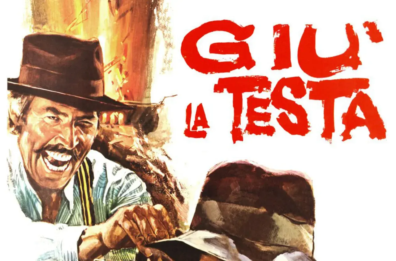 Un uomo con cappello e baffi ride, mentre sullo sfondo campeggia il titolo "Giù la testa spiegazione finale".