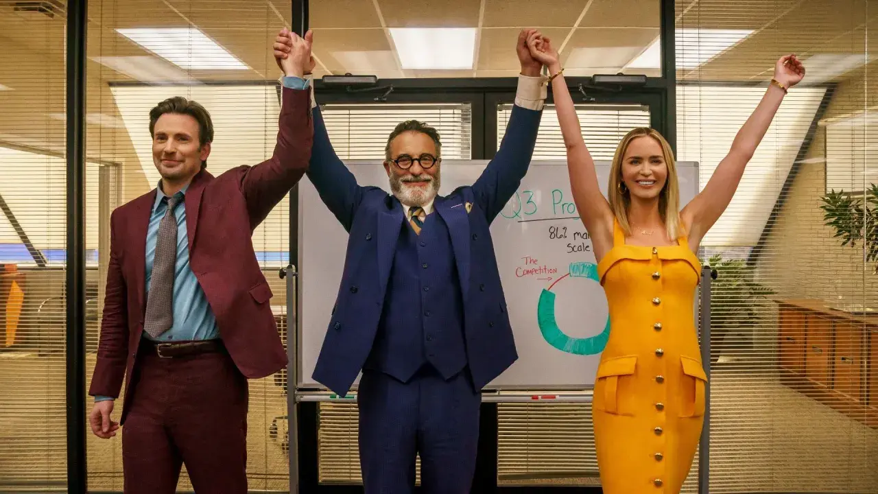 Tre persone celebrano un successo in ufficio, con un grafico alle spalle. Le recensioni di "Pain Hustlers - Il business del dolore" potrebbero descrivere questa scena.