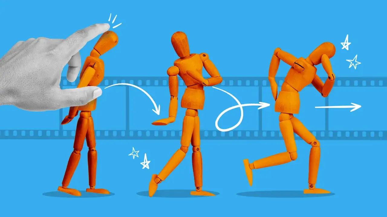 Un dito muove un manichino di legno, creando un'animazione in stop motion. Sequenza di movimento che ricorda i filmati.